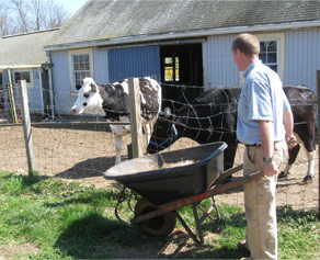 Br. Patrick tends the barn